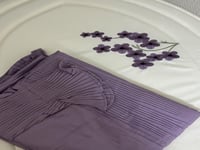 طقم جاهز للشحن مطرز بنفسجي..