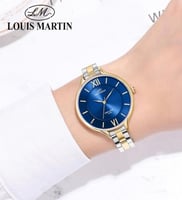 ساعة نسائية من لويس مارتن اللون الفضي والذهبي