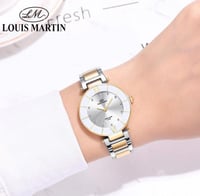 ساعة نسائية من لويس مارتن اللون الذهبي و الفضي