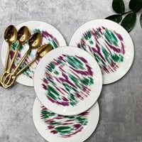 طقم صحون هيرمز مكون من 4 صحون و 4 ملاعق