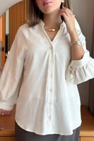 قميص باكمام واسعة لون بيج