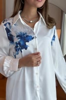 بلوزة موردة باكمام واسعة