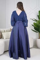 فستان طويل درابيه مزين بالؤلؤ لون كحلي