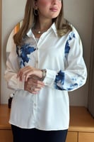 بلوزة موردة باكمام واسعة