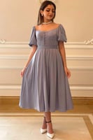 فستان ناعم بتطريز ورد على الكم لون بيبي بلو