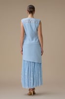 طقم أزرق فاتح بتنورة تول لامعة