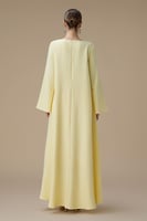 جلابية طويلة ماكسي صفراء بتصميم واسع أنيق