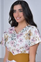 فستان بتصميم لف مشجر مزين بهدب لون بيج