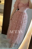 فستان ميدي تول بأكمام بف لون وردي