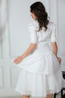 طقم بلوزه وتنوره بتصميم مقسم لون ابيض