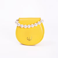 شنطة أُبَّهة باللؤلؤ