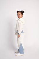 طقم هودي وبنطال بقصّة غير متماثلة