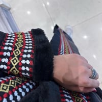 معطف شتوي شرقي طويل مطرز بأناقة