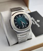 ساعة ماركة باتيك فليب دائري