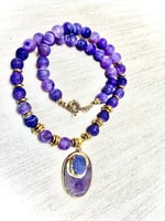 عقد الحجر الإرجواني