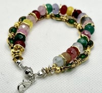 أساور من العقيق و حجر الكرستال الطبيعي