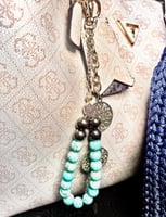 تعليقة للشنطة ،ميدالية للمفتاح