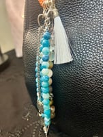 تعليقة شنطة - أو مفاتيح