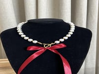 عقد الؤلؤ بالشريطه