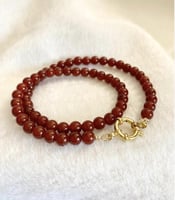 عقد الزئبق الأحمر