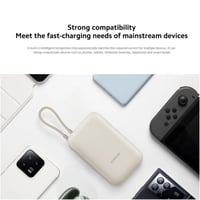 شاومي - شاحن متنقل بمنفذ USB ومنفذ USB-C وسلك مدمج...
