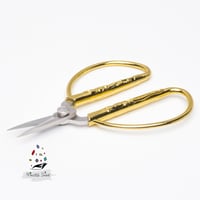 203 - مقص ورق ذهبي