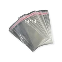 اكياس شفافه لاصقه وطني تزن500 جرام مقاس 14*14