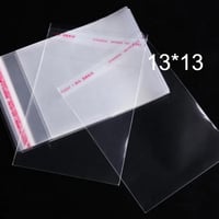 اكياس شفافه لاصقه وطني تزن500 جرام مقاس 13*13