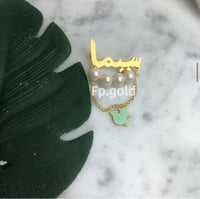 بروش مطلي ذهب مع لولو وحمامه