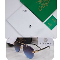 شماغ ملكي + نظارة شمسية هدية