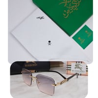 شماغ ملكي + نظارة شمسية هدية