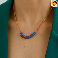 سلسلة ذهبي بزينة ملتوية باللون الاخضر والازرق