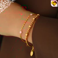 سوارة ذهبي مع زينة بالمنتصف