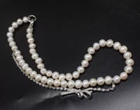 عقد اللولو الطبيعي وقوس الزركون