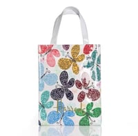 حقيبة تسوق عليها شعار هارودز بنقوش فراشات ملونة-مق...