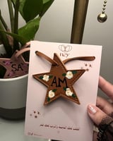 تعليقة -نجّـمه- مرسومه يدوياً