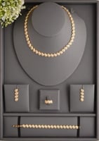 طقم زركون ذهبي بتصميم أوراق ناعم