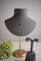 سلسال تشوكر ذهبي طقم برسيم رباعي أخضر