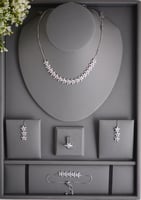 طقم فاخر بترصيع زهور زركون متلألئة