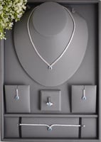 طقم مجوهرات فاخر بتصميم عصري مع زركون أزرق لامع