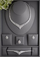 طقم مجوهرات نسائي أنيق بفصوص متشابكة براقة