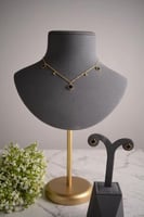 سلسال تشوكر ذهبي طقم برسيم رباعي أسود