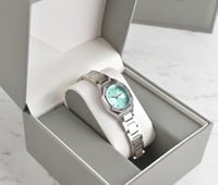 ساعة نسائية بلون فضي [313]