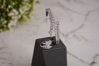 طقم أساور وخواتم فضي مزخرف بأحجار لامعة لإطلالة سا...