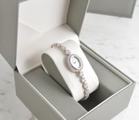 ساعة نسائية زركون فضي [328]