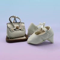 طقم كعب سفنجي وشنطة شبيهة ايرميز للمواليد