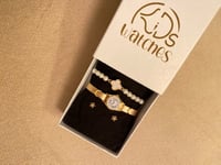 طقم مواليد شكل ساعة ذهبي