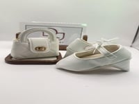 طقم كعب سفنجي وشنطة شبيهة شانيل للمواليد