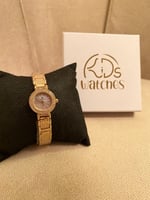 ساعة دائري بفصوص ذهبي