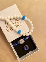 طقم مواليد شكل ساعة ازرق